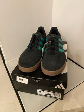 Adidas Men’s/Womens Barreda Black Sneaker with Green Stripes and Gum Sole,NWT